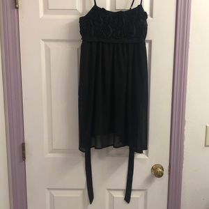 Black dress with rose twists